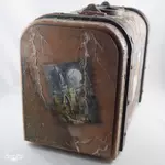 Sárkányos bőrönd